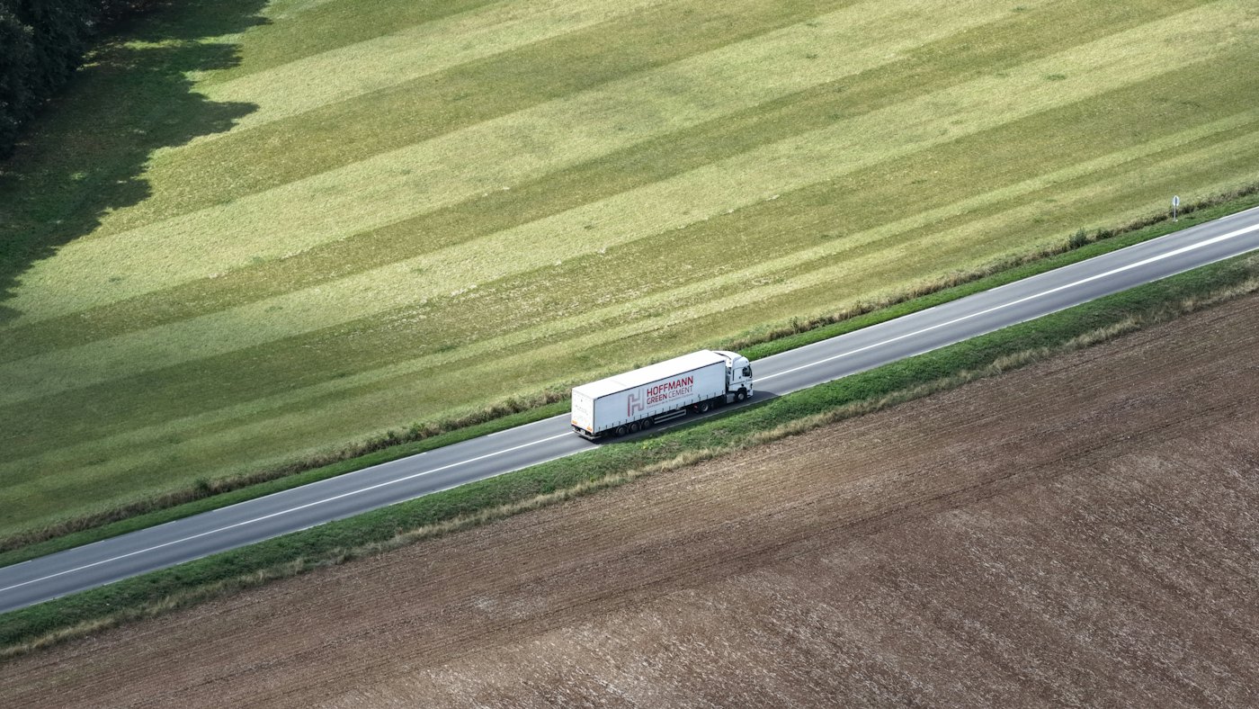 Aerial view of a tractor-trailer on a rural highway